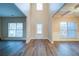 Spacious entryway featuring hardwood floors, a soaring ceiling, and plenty of natural light at 4280 Hunters Walk Way, Cumming, GA 30028