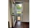 Back door with built in pet door and view of the backyard at 2586 Abbotts Glen Dr, Acworth, GA 30101