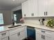 Lovely kitchen featuring a sink with countertop and stainless steel dishwasher at 2586 Abbotts Glen Dr, Acworth, GA 30101