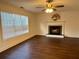 Bright living room features hardwood floors and a fireplace at 2586 Abbotts Glen Dr, Acworth, GA 30101