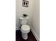 Powder room featuring a toilet, white walls and a plant at 2586 Abbotts Glen Dr, Acworth, GA 30101