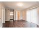 This bedroom offers hardwood floors, natural light, and closet and bathroom access at 2897 Hedgewood Nw Dr, Atlanta, GA 30311