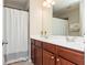 Bathroom featuring a double vanity and a shower with a curtain at 2826 Loftview Sq # 4, Atlanta, GA 30339