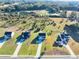 Aerial view showcasing property lines, landscaping, and surrounding neighborhood at 3555 New Hope Rd, Dacula, GA 30019