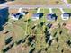 Aerial view of property showcasing lot size, landscaping, and neighborhood surroundings at 3555 New Hope Rd, Dacula, GA 30019