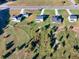 Aerial view of the home's placement, neighborhood, and the surrounding green space at 3555 New Hope Rd, Dacula, GA 30019