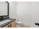 Half bath features granite countertop and undermount sink at 3555 New Hope Rd, Dacula, GA 30019