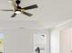 Bedroom with a ceiling fan and window providing natural light at 3555 New Hope Rd, Dacula, GA 30019