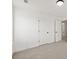 Neutral bedroom featuring carpet flooring and modern lighting at 3555 New Hope Rd, Dacula, GA 30019