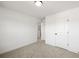 Bedroom features neutral carpet and bright white walls at 3555 New Hope Rd, Dacula, GA 30019