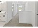 Second-floor hallway with carpet and natural light at 3555 New Hope Rd, Dacula, GA 30019