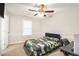 This bedroom includes a modern ceiling fan and ample natural light at 170 Charlotte Blvd, Stockbridge, GA 30281