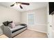 Bedroom features a comfortable daybed and plenty of natural light at 170 Charlotte Blvd, Stockbridge, GA 30281