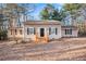 Charming one-story home with neutral siding, black shutters, and a welcoming front porch at 170 Charlotte Blvd, Stockbridge, GA 30281