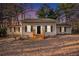 Charming one-story home with neutral siding, black shutters, and a welcoming front porch at 170 Charlotte Blvd, Stockbridge, GA 30281
