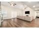 Bright and airy living room with modern flooring, a fireplace, and ample space at 170 Charlotte Blvd, Stockbridge, GA 30281