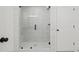 Modern shower featuring white marble-style tile and glass door at 3563 New Hope Rd, Dacula, GA 30019