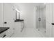 Stylish bathroom featuring a glass enclosed shower with tile surround and modern fixtures at 3563 New Hope Rd, Dacula, GA 30019