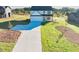 New construction home featuring a manicured lawn, concrete driveway, and a two-car garage at 3563 New Hope Rd, Dacula, GA 30019