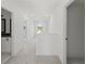 Hallway with access to rooms, including a bathroom with modern fixtures at 3563 New Hope Rd, Dacula, GA 30019