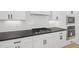 Kitchen featuring granite countertops, white cabinets, and stainless steel appliances at 3563 New Hope Rd, Dacula, GA 30019