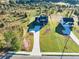 Aerial view of a modern home on a large lot in a lush, green community at 3567 New Hope Rd, Dacula, GA 30019