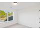 Bright bedroom with a large window and neutral carpet flooring at 3567 New Hope Rd, Dacula, GA 30019