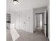 Hallway featuring doorways and neutral carpet flooring at 3567 New Hope Rd, Dacula, GA 30019
