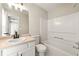 Bathroom with a single vanity, a standard toilet, and a shower-tub combo at 1381 Vintage Pointe Dr, Lawrenceville, GA 30044