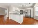 Modern kitchen featuring granite countertops, stainless steel appliances, and ample cabinetry at 1381 Vintage Pointe Dr, Lawrenceville, GA 30044