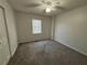 Bedroom with neutral carpet, a window, and simple decor, perfect for personalization at 32 Ne Moriah Way, Rydal, GA 30171