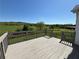 Back deck features nice views of the pasture and rolling hills at 32 Ne Moriah Way, Rydal, GA 30171