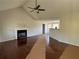 Spacious living room featuring a fireplace, hardwood floors, and an open layout at 32 Ne Moriah Way, Rydal, GA 30171