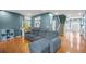 Spacious living room with a view to the entryway, stairs, and kitchen with hardwood floors at 340 Lazy Willow Ln, Lawrenceville, GA 30044