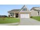 A beautiful, single-Gathering home with brick and vinyl siding, complemented by a well-maintained lawn at 48 Masters Dr, Villa Rica, GA 30180