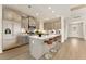 Bright, modern kitchen featuring a large island with seating, stainless steel appliances and stylish cabinetry at 48 Masters Dr, Villa Rica, GA 30180