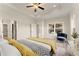 Comfortable main bedroom with large window and stylish, neutral decor at 48 Masters Dr, Villa Rica, GA 30180