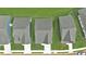 Aerial view of homes with well-maintained lawns and driveways in a residential neighborhood at 61 Colonial Terrace, Villa Rica, GA 30180