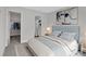 Spacious bedroom with large bed and views into the walk-in closet and bathroom at 61 Colonial Terrace, Villa Rica, GA 30180