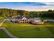 Stunning clubhouse exterior with manicured lawns and golf course views at 61 Colonial Terrace, Villa Rica, GA 30180