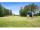 Golf course in a lush green setting with golfers playing at 61 Colonial Terrace, Villa Rica, GA 30180