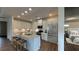 Well-equipped kitchen with stainless steel appliances, granite countertops, and ample cabinet space at 61 Colonial Terrace, Villa Rica, GA 30180