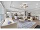 Bright open-concept living area flows into the modern kitchen with island seating at 61 Colonial Terrace, Villa Rica, GA 30180