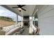 Relaxing outdoor patio with comfortable seating, a fireplace, and scenic views at 61 Colonial Terrace, Villa Rica, GA 30180
