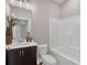 Contemporary bathroom with white tub and vanity at 71 Colonial Terrace, Villa Rica, GA 30180