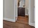 Bathroom view showcasing dark brown wood-look flooring and neutral walls at 71 Colonial Terrace, Villa Rica, GA 30180