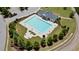 Aerial view of a community pool with lounge chairs and landscaping in a residential neighborhood at 71 Colonial Terrace, Villa Rica, GA 30180