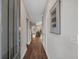 Inviting hallway with wood flooring and neutral paint, leading into the main living space at 71 Colonial Terrace, Villa Rica, GA 30180