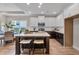 Modern kitchen with a center island, pendant lighting, stainless steel appliances and hardwood floors at 71 Colonial Terrace, Villa Rica, GA 30180
