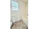Clean and functional bathroom with a tub-shower combination and tiled floors at 125 Whistle Way, Locust Grove, GA 30248